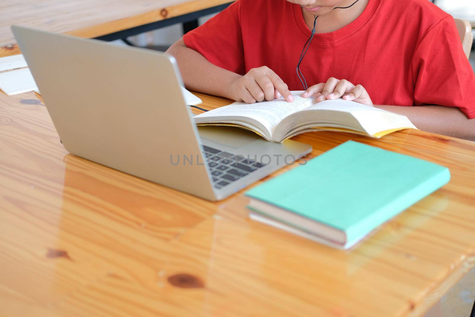 asian boy student studying learning lesson online. remote meeting distance education at home