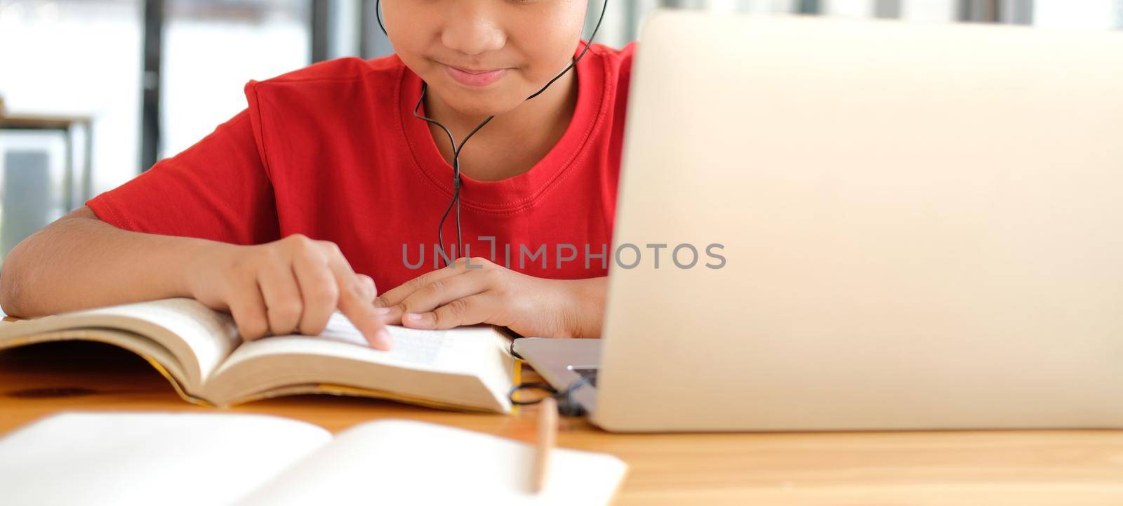 asian boy student studying learning lesson online. remote meeting distance education at home