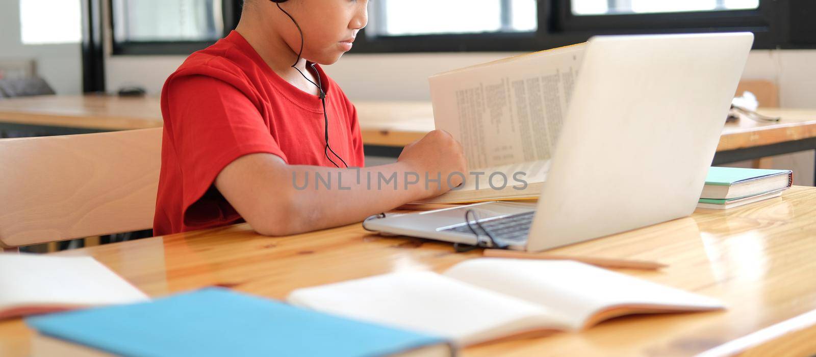 boy student studying learning lesson online. remote meeting distance education at home by pp99