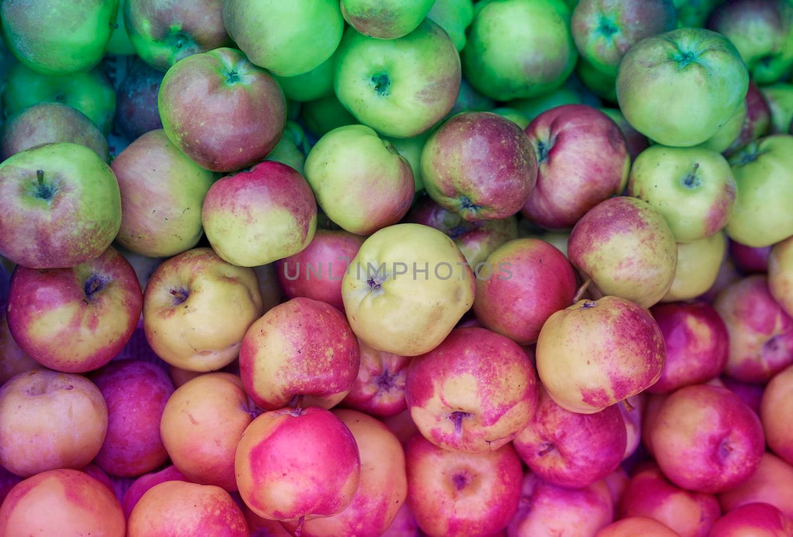 Natural background of red-green apples.