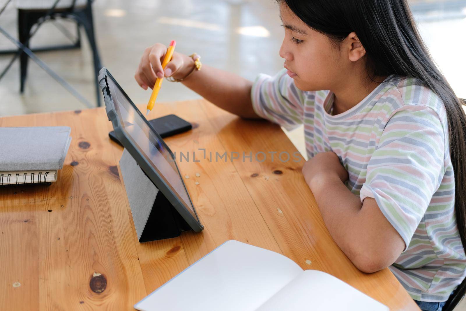 asian girl student studying learning lesson online. remote meeting distance education at home