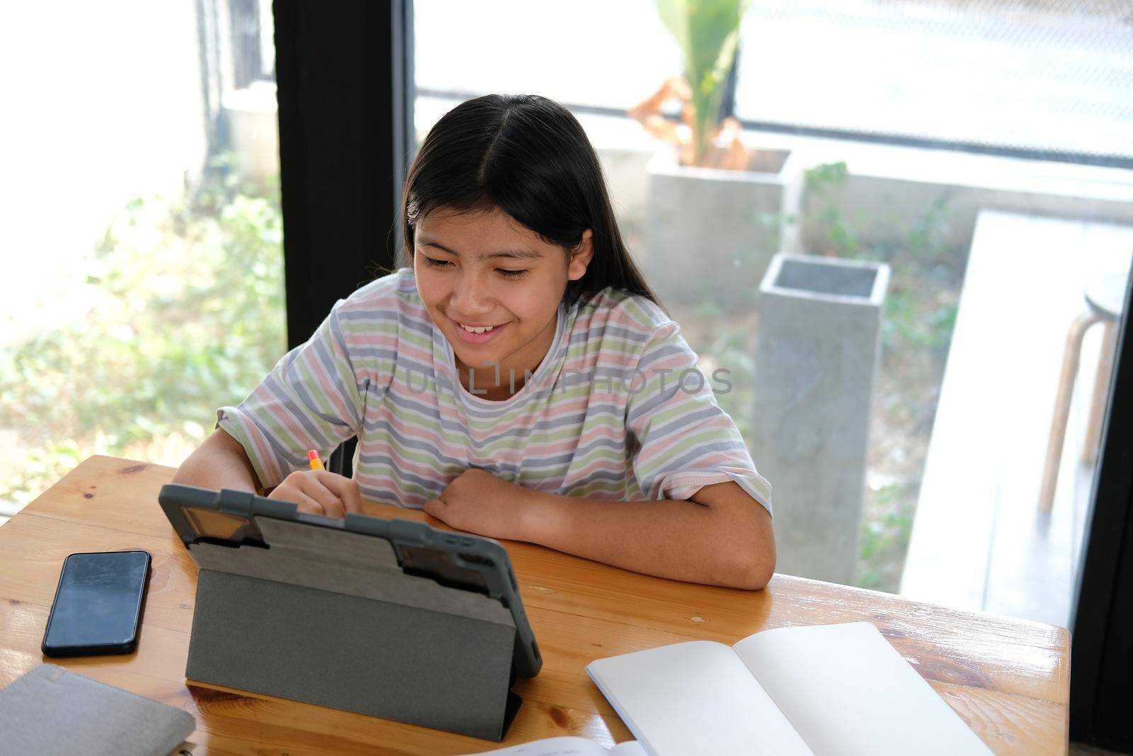 asian girl student studying learning lesson online. remote meeting distance education at home