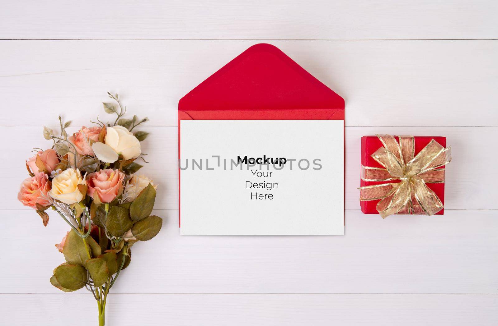 Valentine day, greeting card mockup and letter and flower on wooden table, postcard blank and gift box with romance on desk, present in anniversary and celebration, top view, holiday concept.