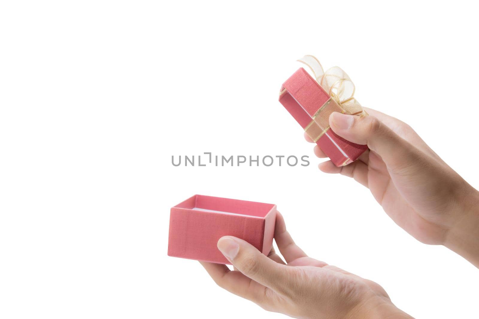 Hand open red gift box with lid isolated on white background, hand giving presents of birthday for surprise in anniversary, romance and love, feeling happy, Valentine or Christmas day concept.