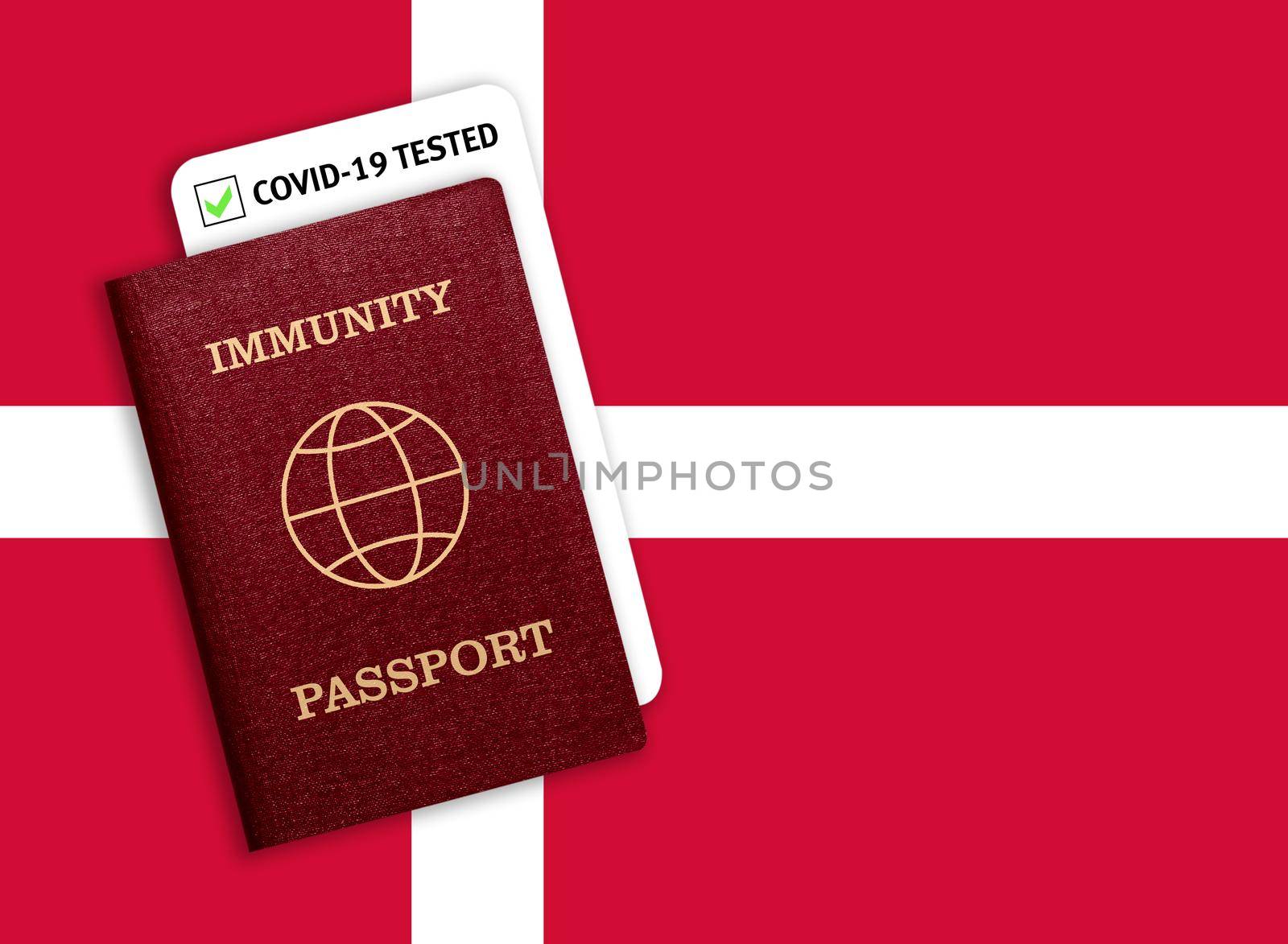 Concept of Immunity passport, certificate for traveling for people who had coronavirus or made vaccine and test result for COVID-19 on flag of Denmark