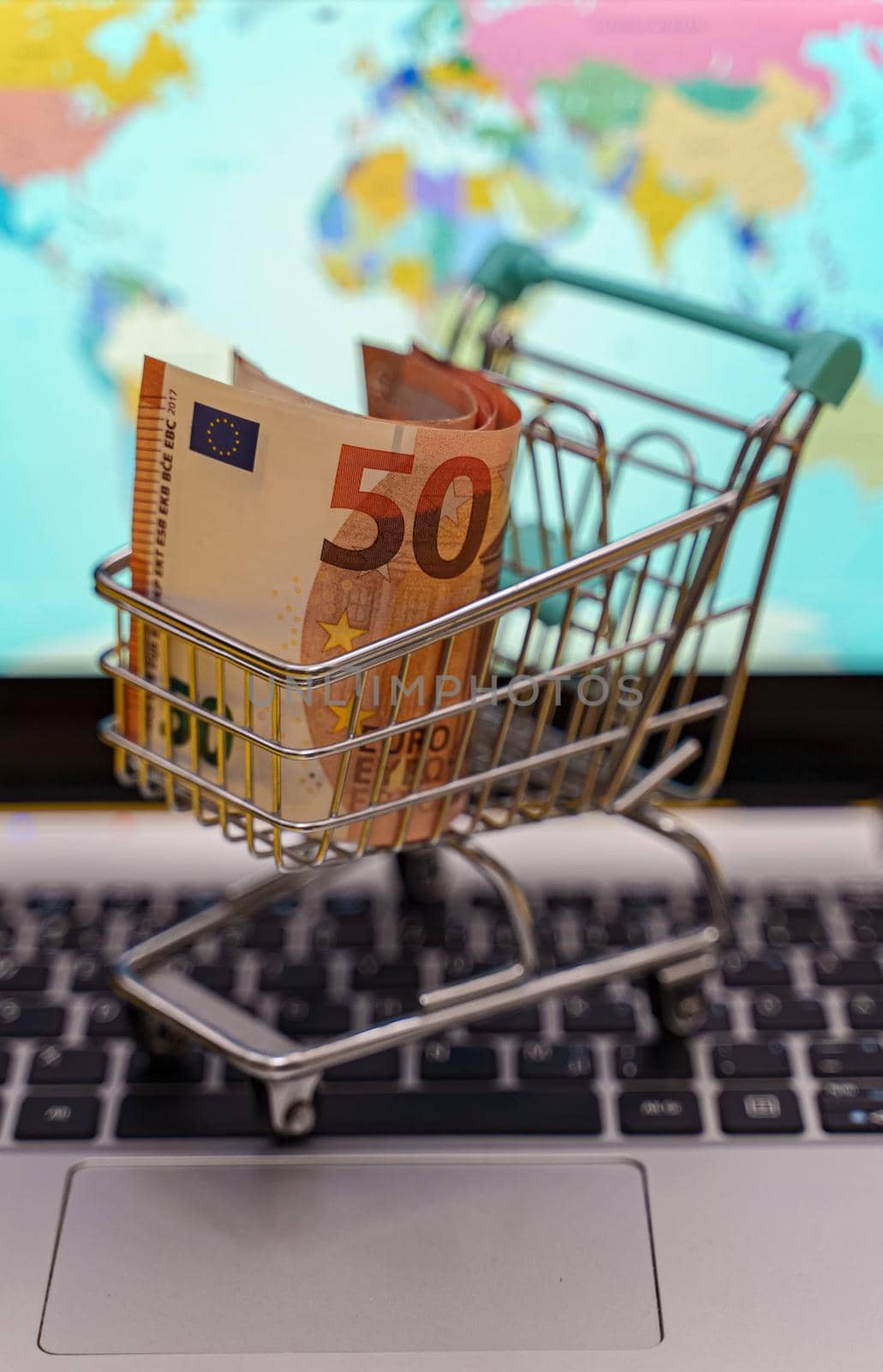 Shopping cart with euro banknotes. Online shopping concept. by dmitrimaruta