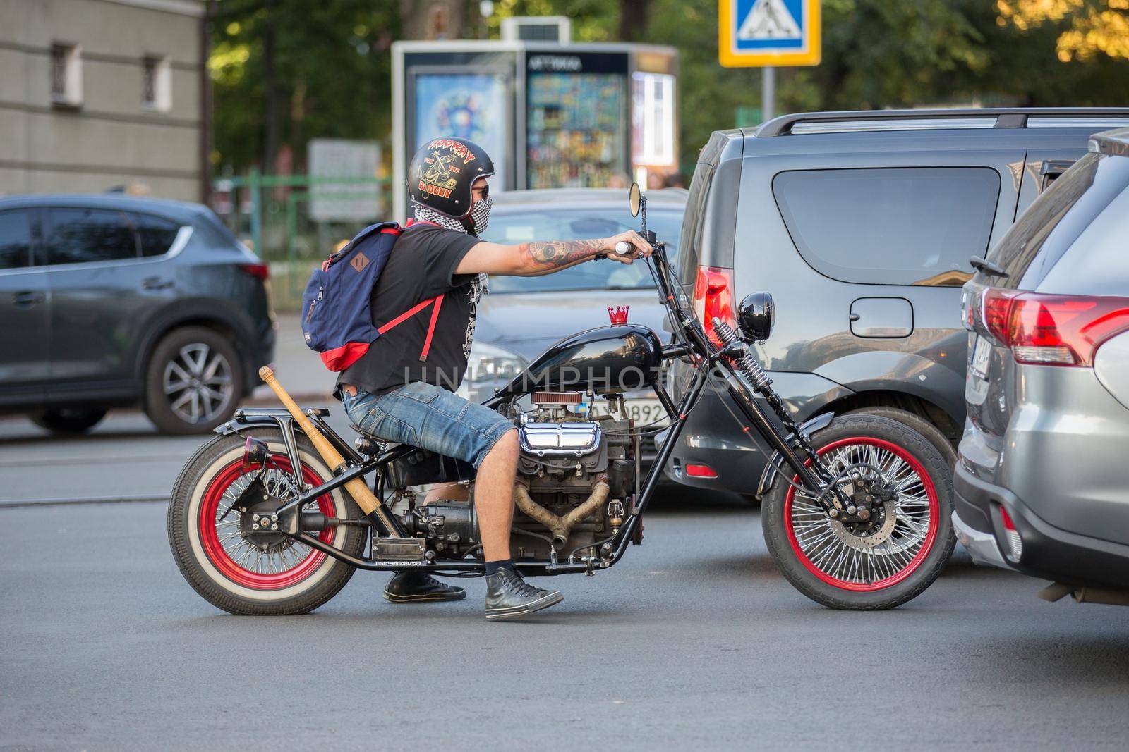 Ukraine. The city of Kharkov. September 10, 2019. Biker on a motorcycle in the city center. by Yurii73
