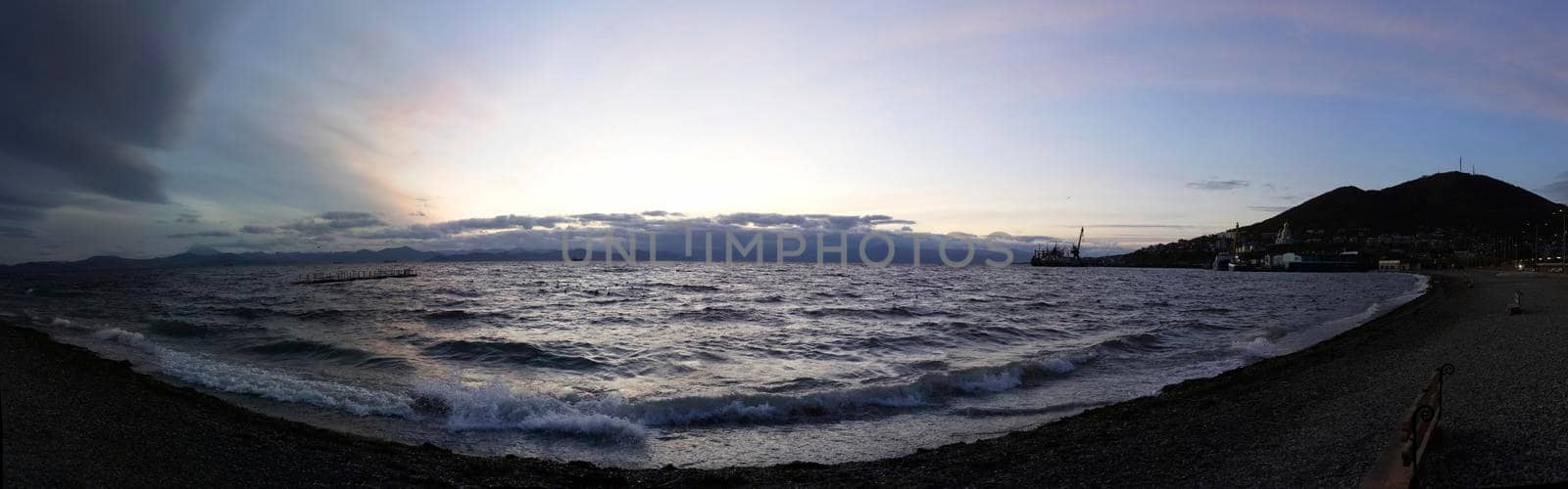 Panorama of the sea landscape in the evening on the waterfront of the city. Petropavlovsk-Kamchatsky, Russia.