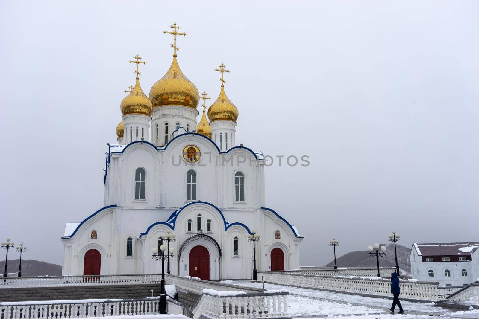 Petropavlovsk-Kamchatsky, Russia-October 6, 2019: the Church of St. Nicholas against a white snowy sky.
