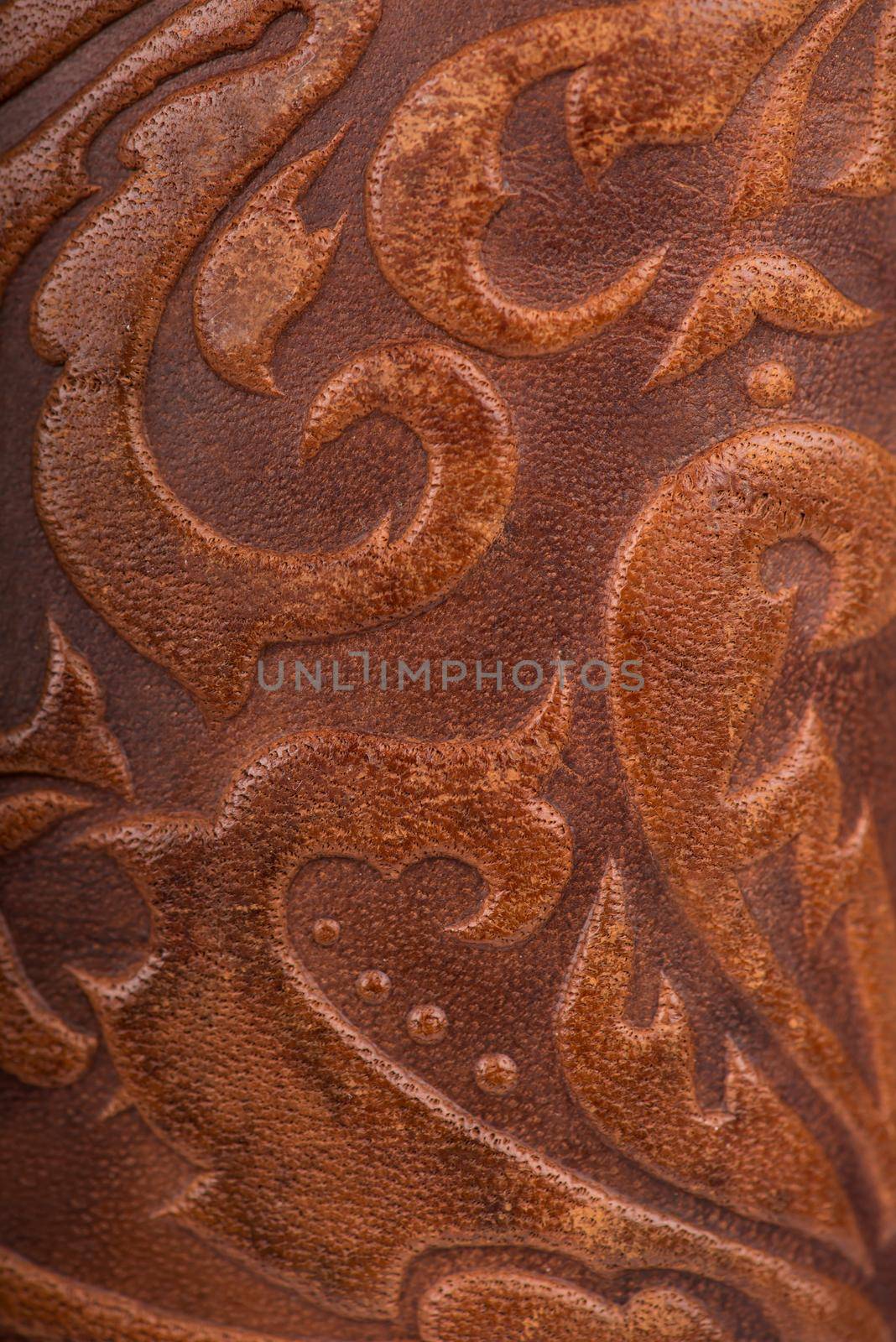 Leather floral pattern deep red color background by aprilphoto