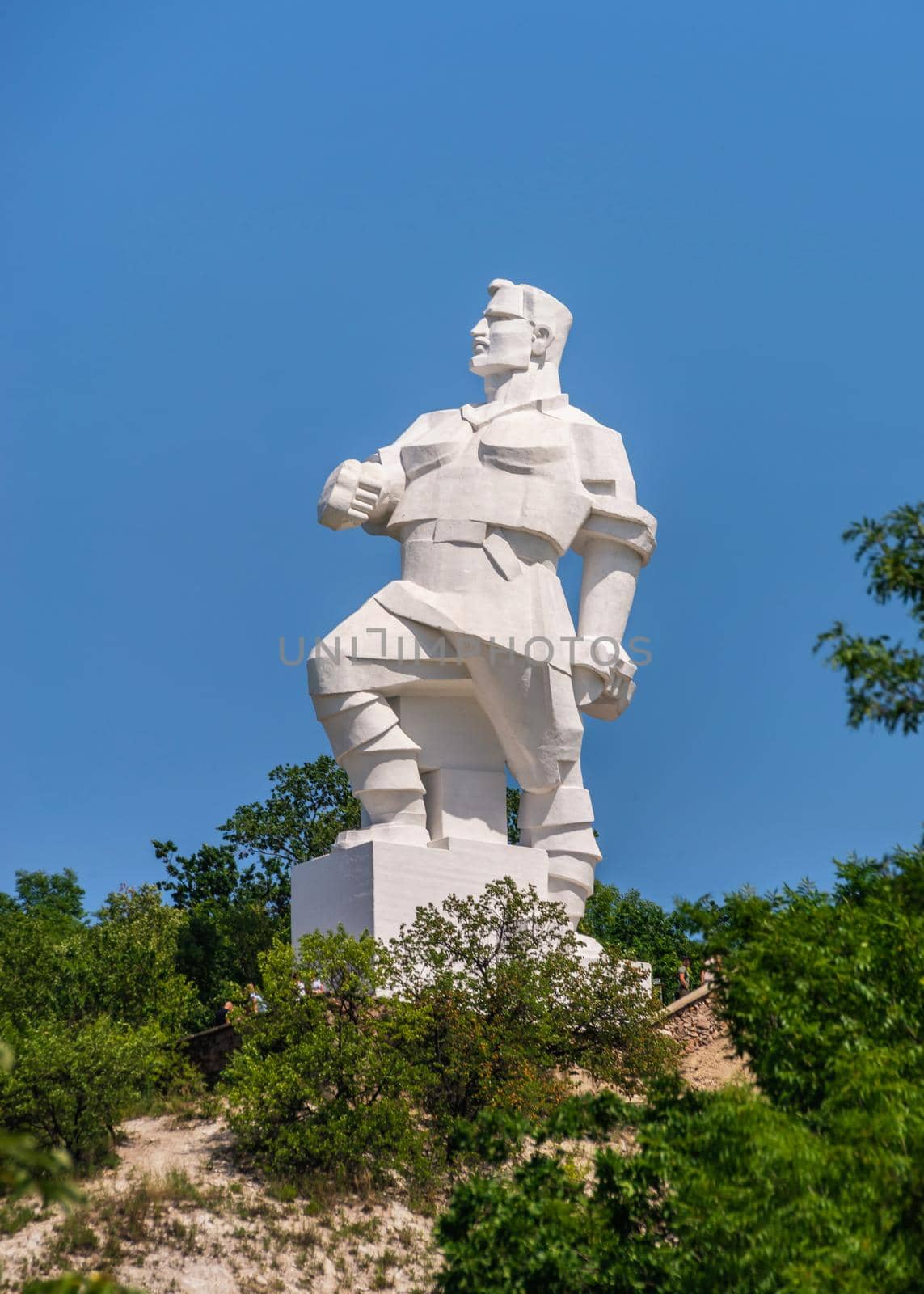 Svyatogorsk, Ukraine 07.16.2020.  Monument to Artem on the mountain above the Svyatogorsk or Sviatohirsk lavra on a sunny summer day