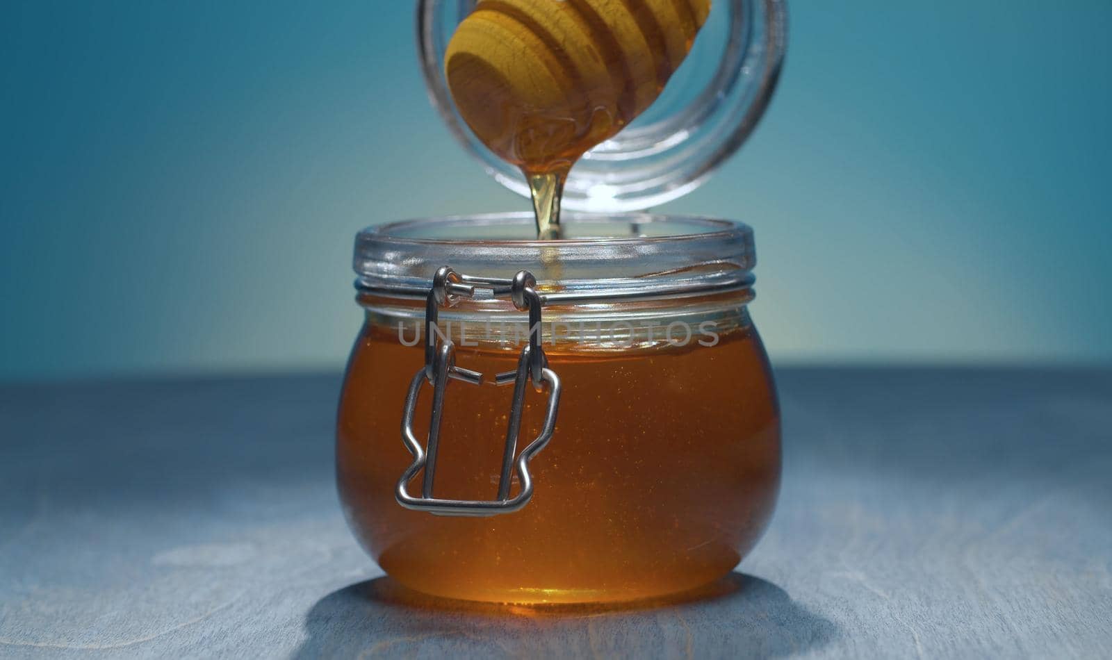 Honey on blue background by Alize