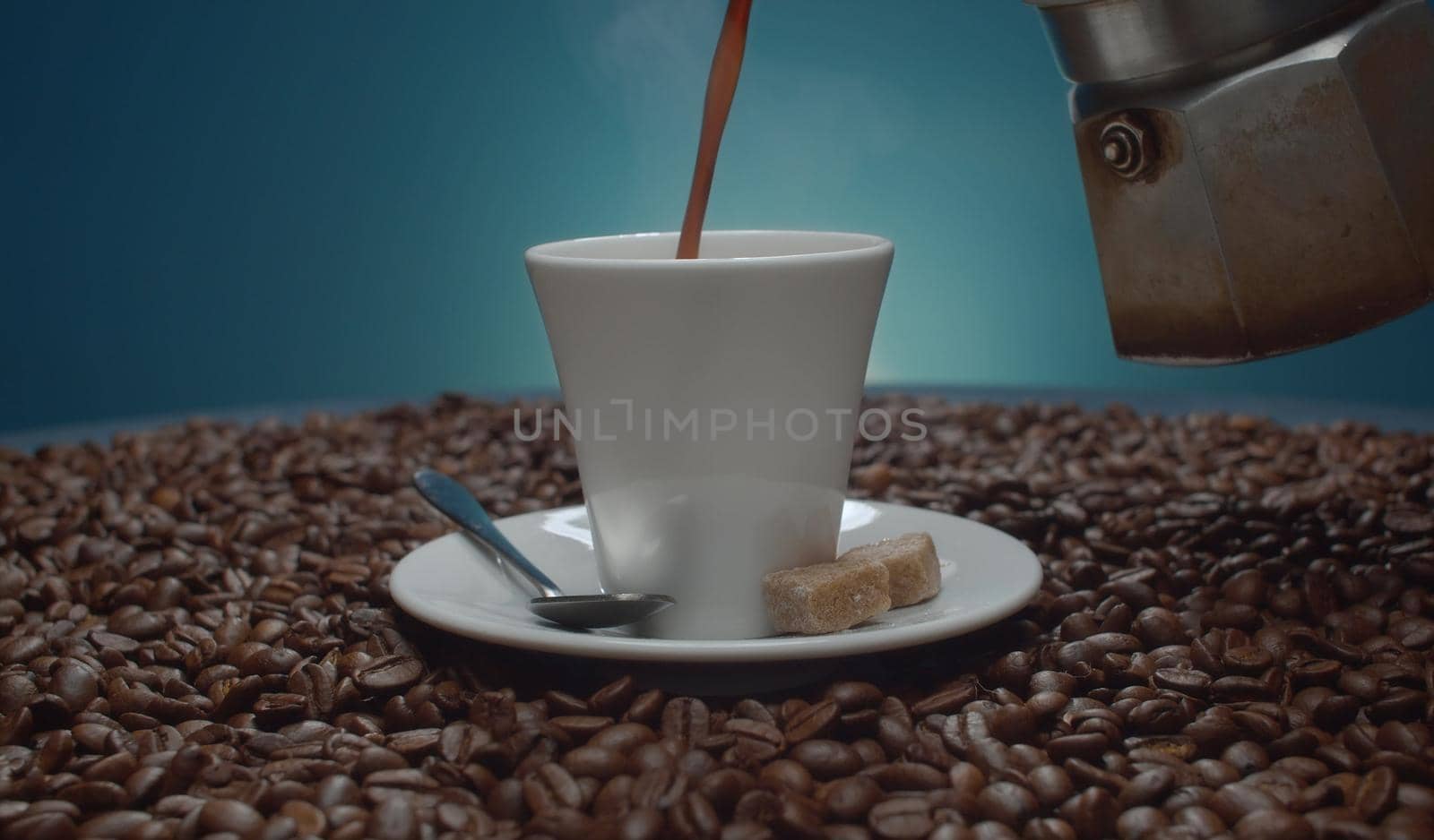 Coffee pouring into a cup by Alize