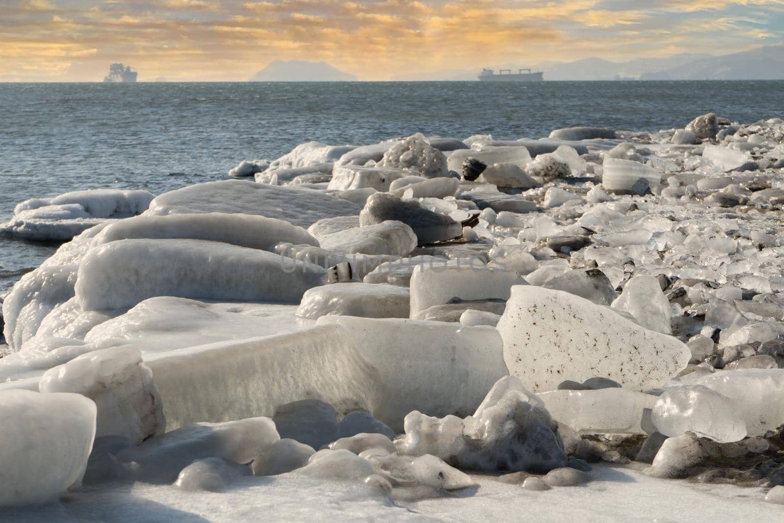 Natural background with chunks of shiny sea ice