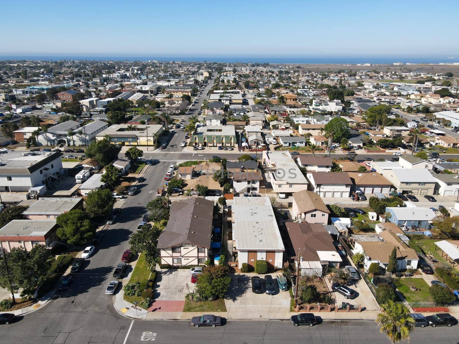 Aerial view of street and houses in Imperial Beach area in San Diego by Bonandbon
