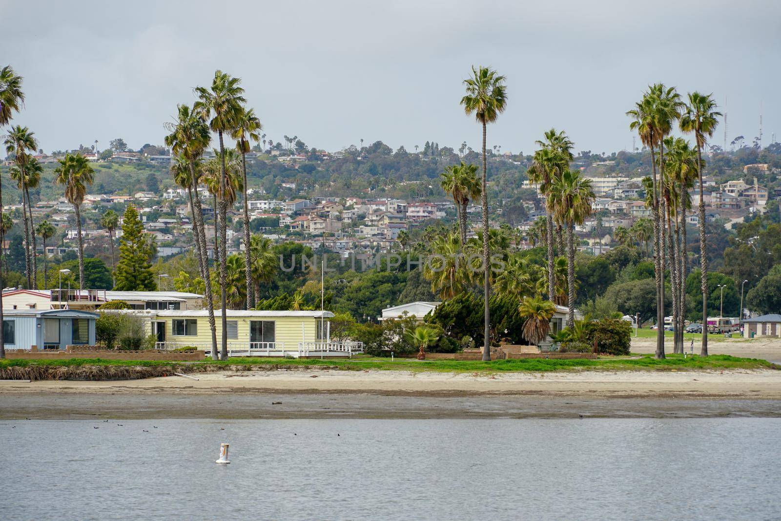 Caravan and home trailer park area next the water in the De Anza Cove in Mission Bay in San Diego by Bonandbon