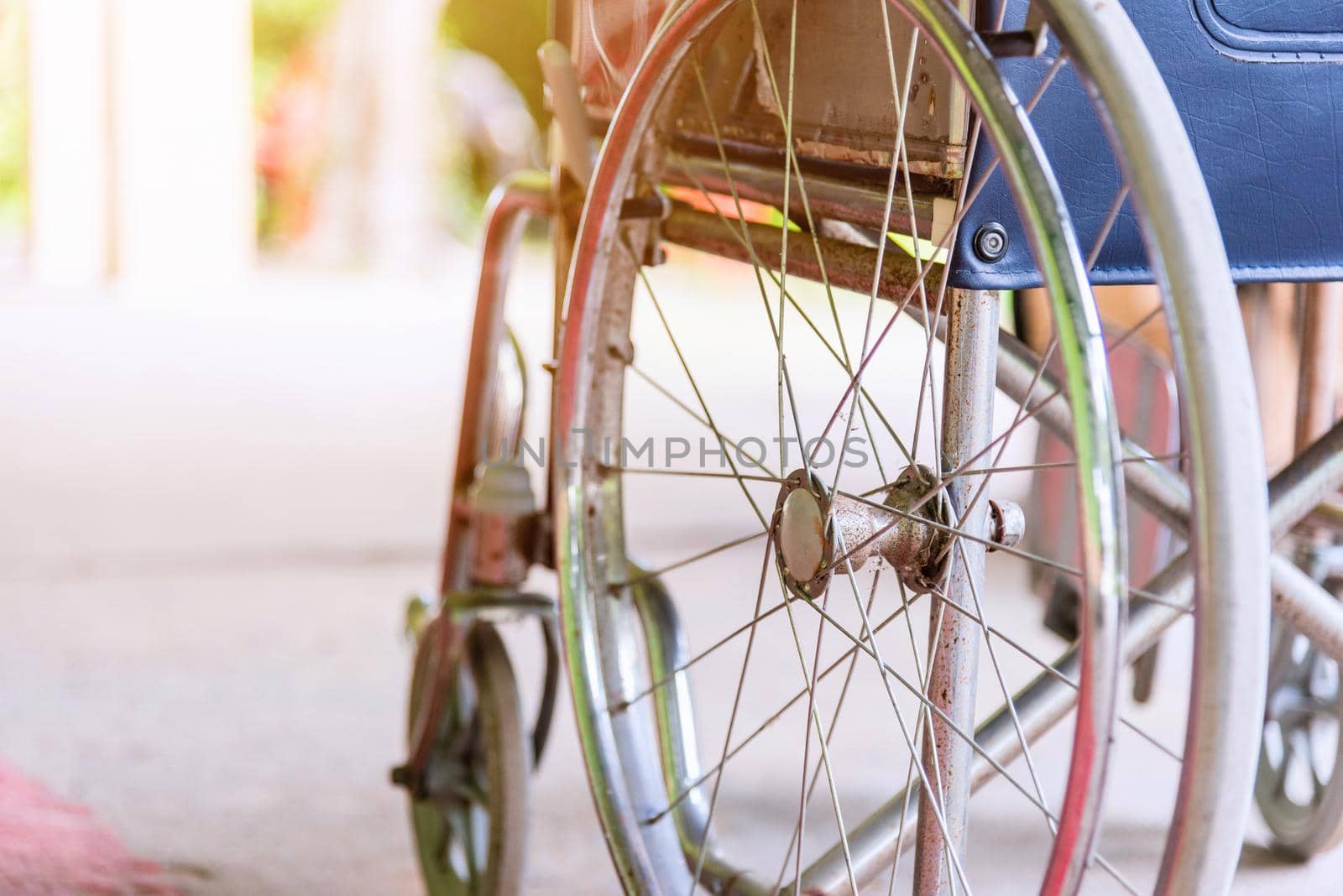 Closeuo empty wheelchairs in the hospital parked waiting for physical patient services, medical care concept