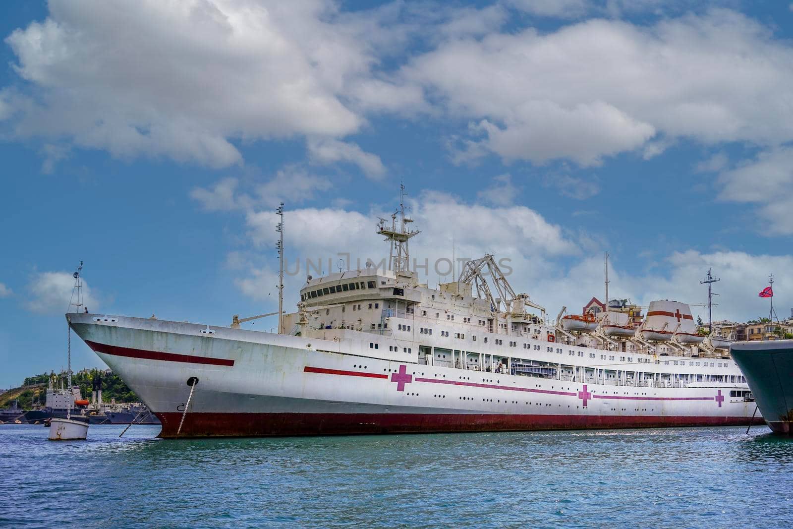 Sevastopol, Crimea. Seascape with views of the coastline and ships. Hospital ship on the dock.