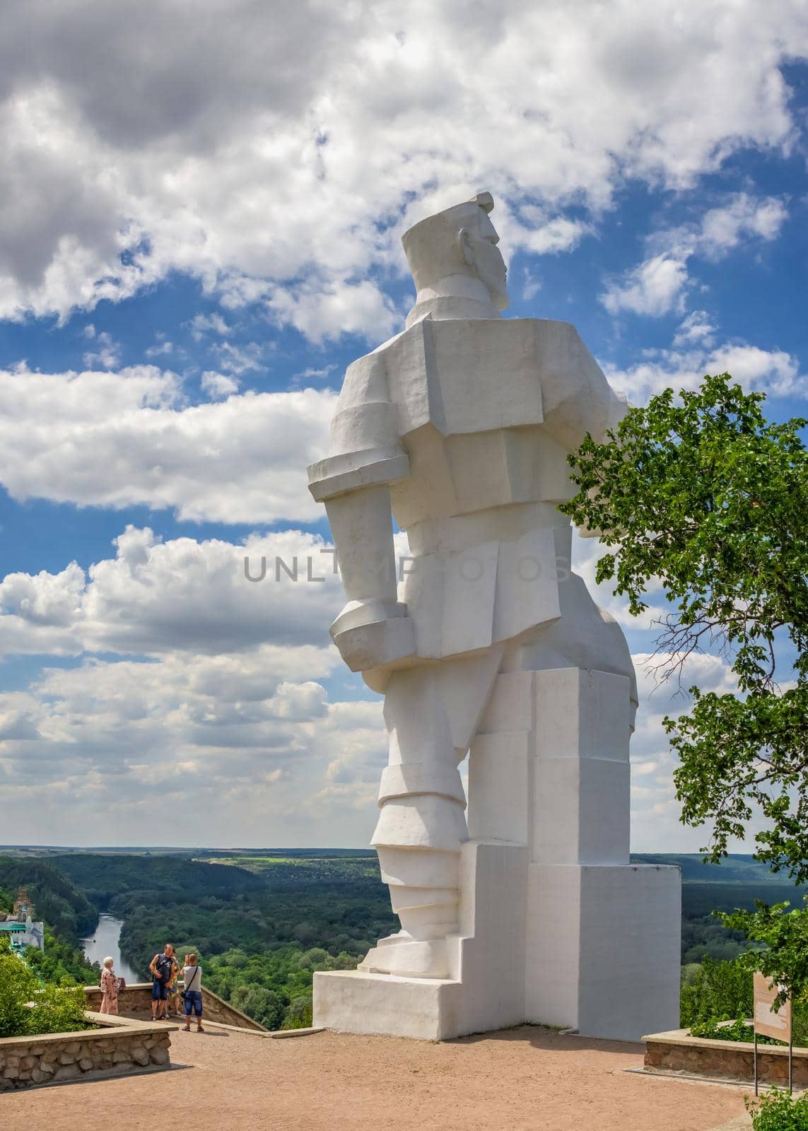 Svyatogorsk, Ukraine 07.16.2020.  Monument to Artem on the mountain above the Svyatogorsk or Sviatohirsk lavra on a sunny summer morning