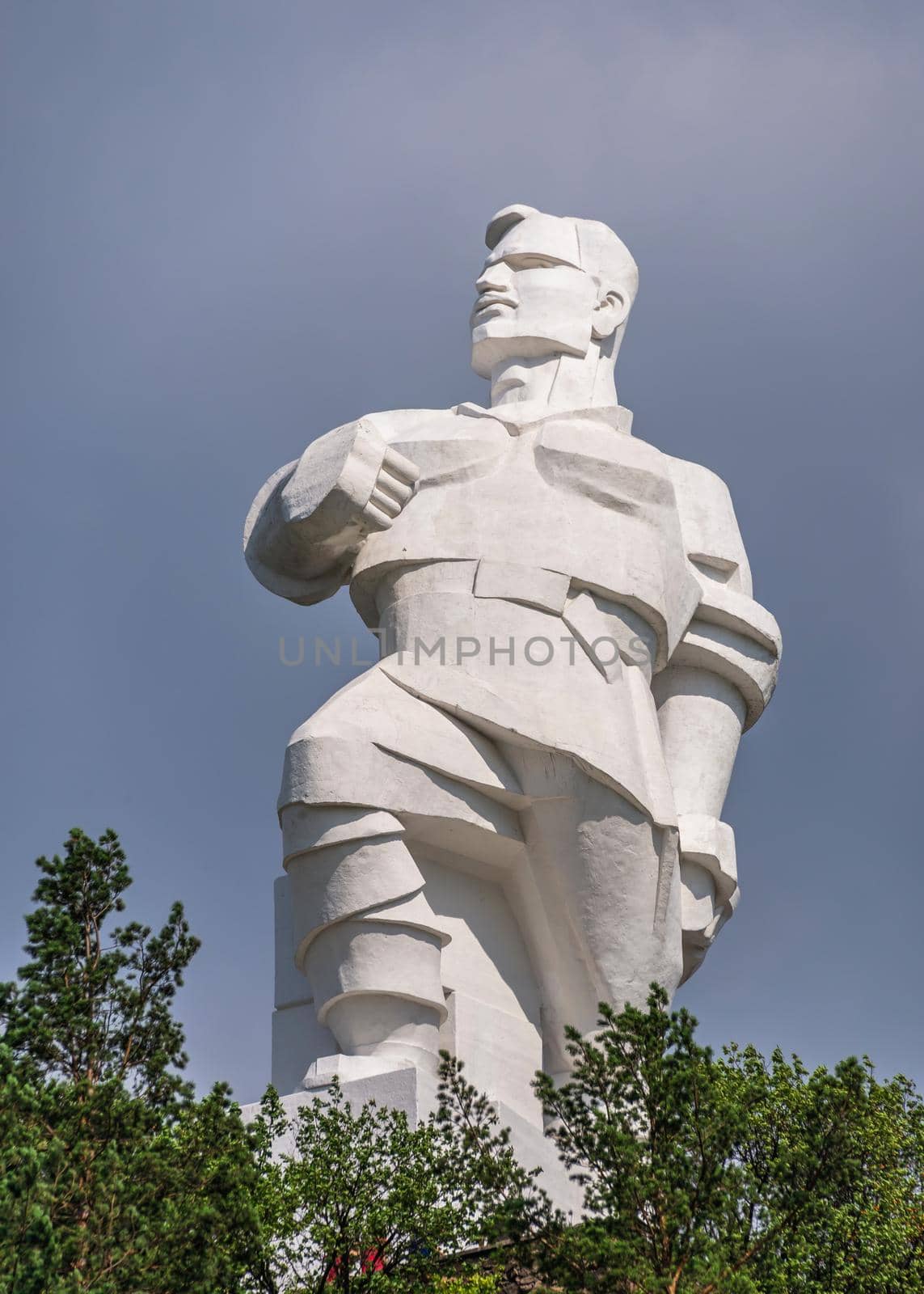 Svyatogorsk, Ukraine 07.16.2020.  Monument to Artem on the mountain above the Svyatogorsk or Sviatohirsk lavra on a sunny summer morning