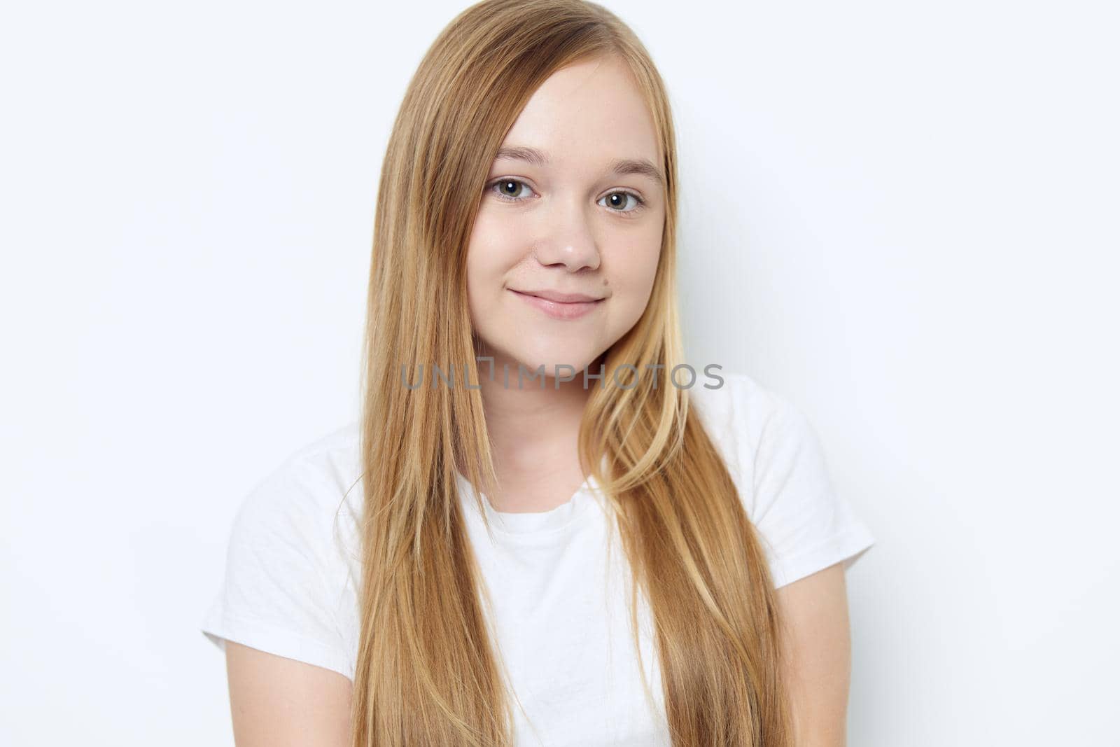 smiling girl blonde hair cropped view Studio isolated background by SHOTPRIME