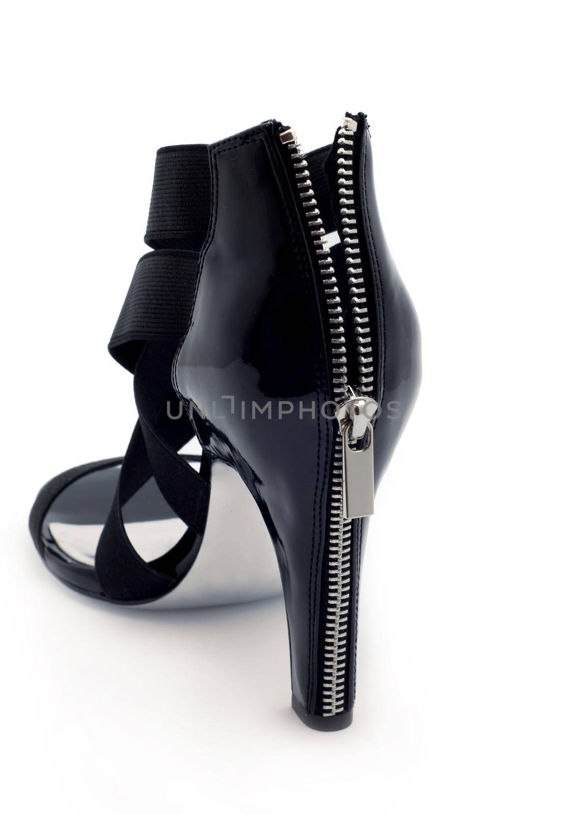 Shoes on high heel isolated on white by aprilphoto