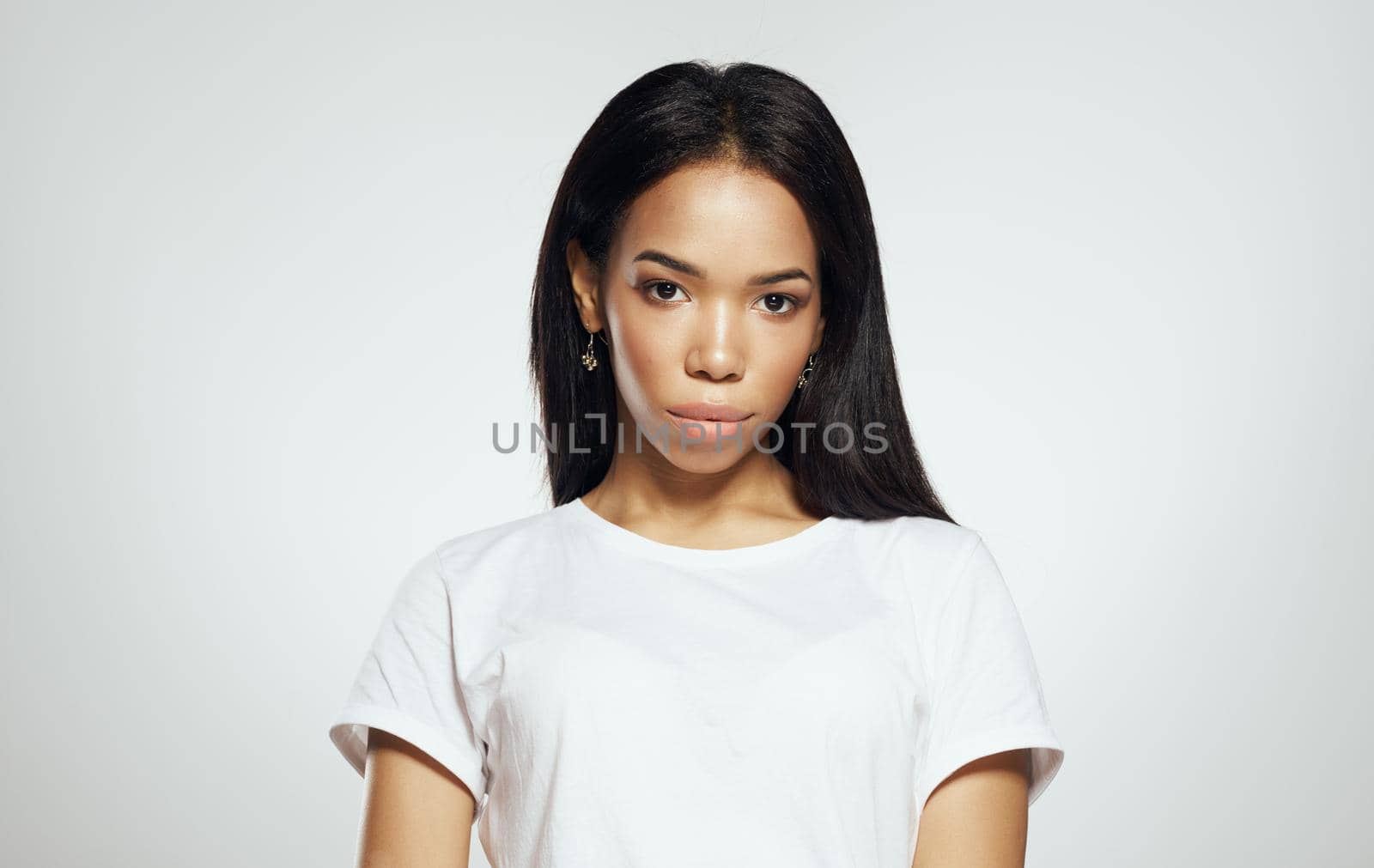 Pretty woman african appearance white tank top attractive look glamor model. High quality photo