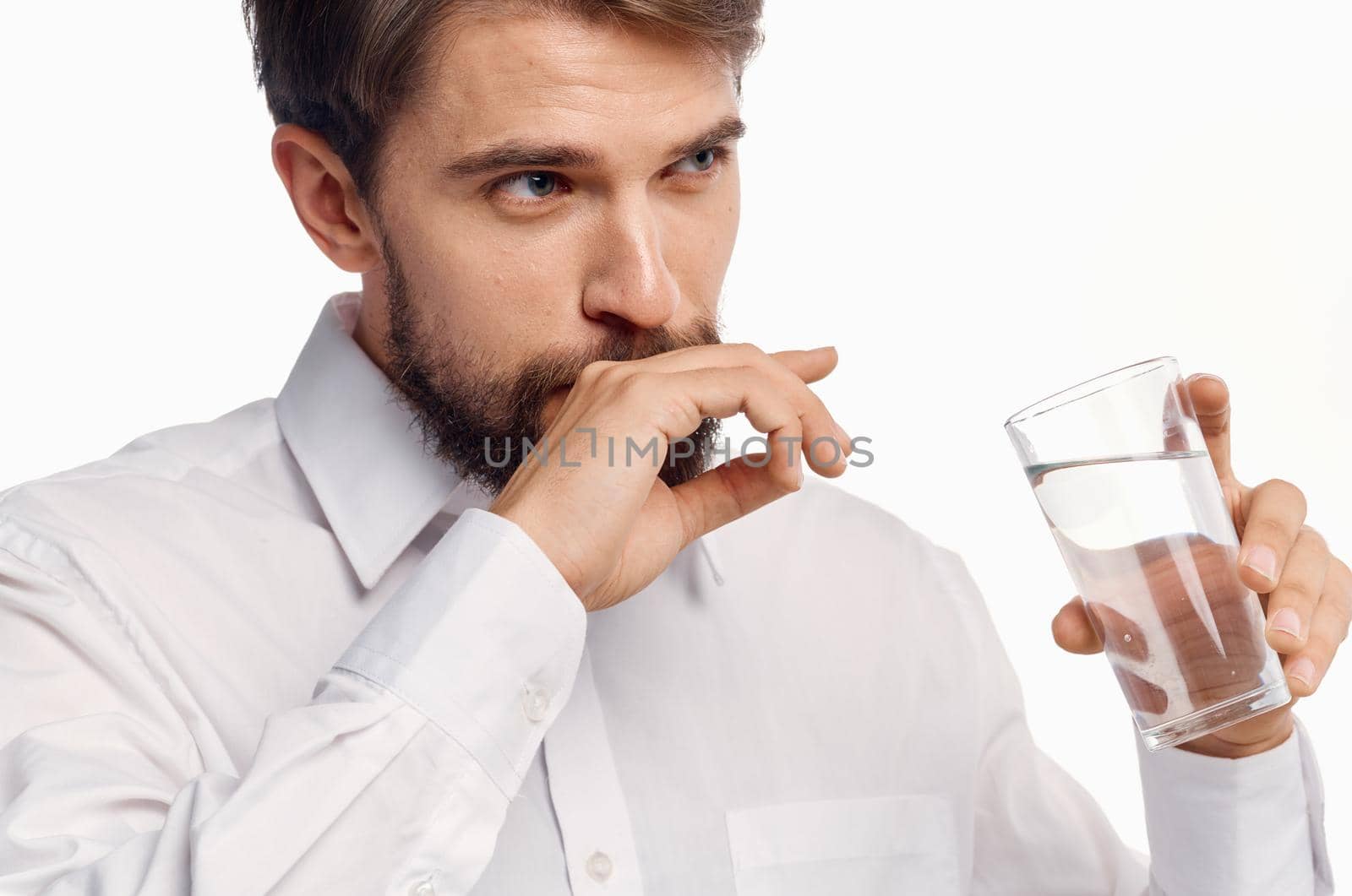 man with glass of water portrait model cropped view lifestyle. High quality photo
