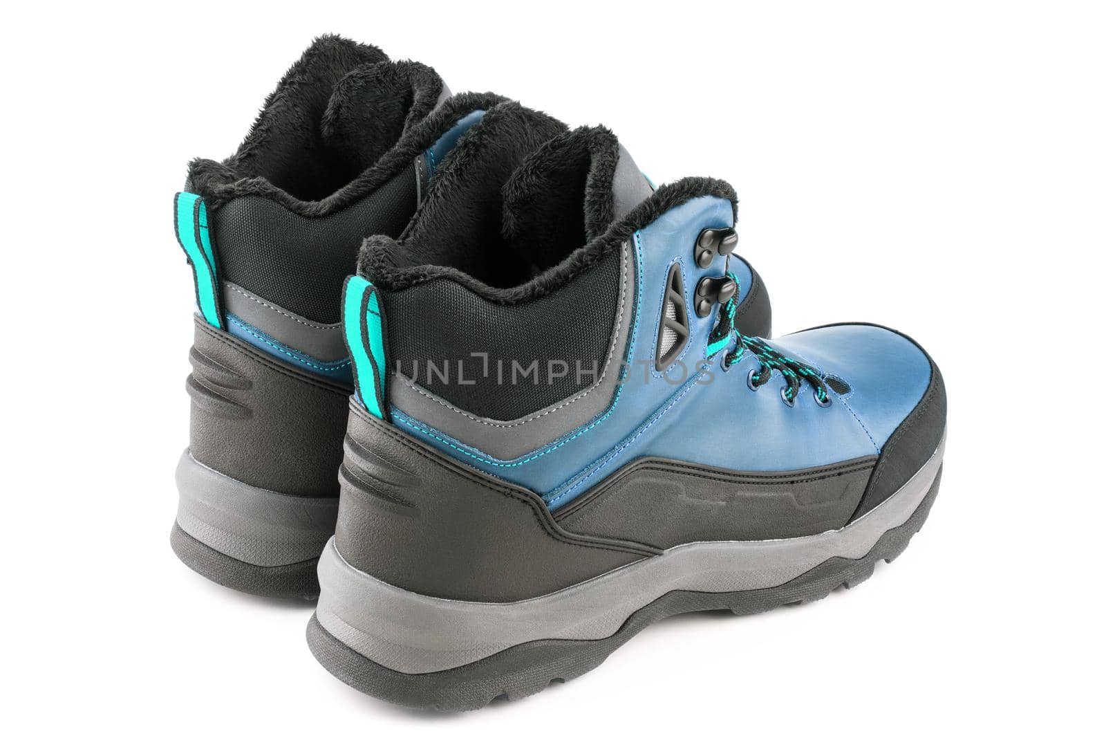 pair of mint blue insulated winter warm three quarter sneaker or boot isolated on white background, perspective view