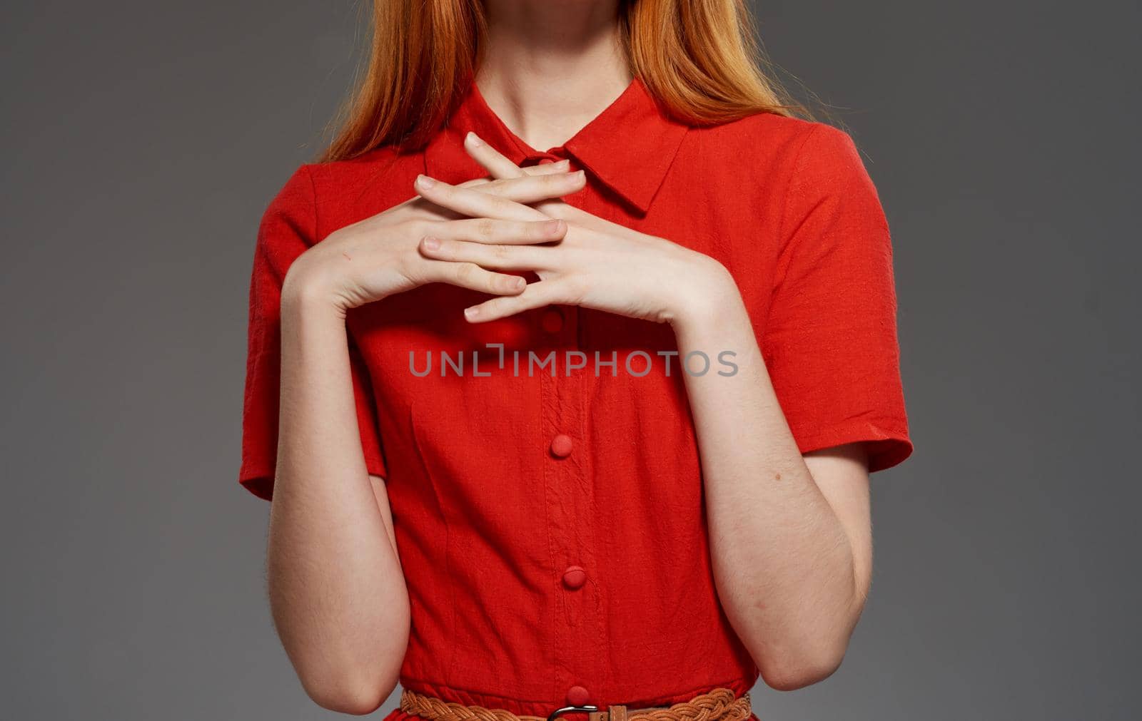 Woman Model In Red Dress On Isolated Background Cropped With Copy Space by SHOTPRIME