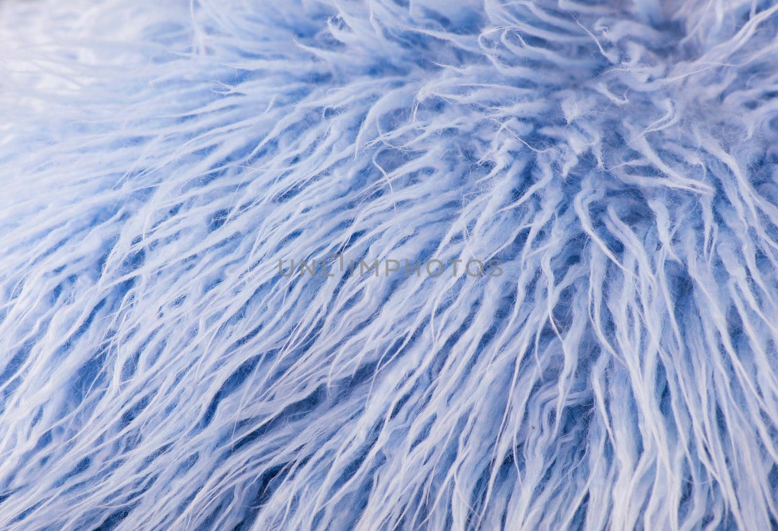 soft blue color faux fur fabric fluffy background by aprilphoto