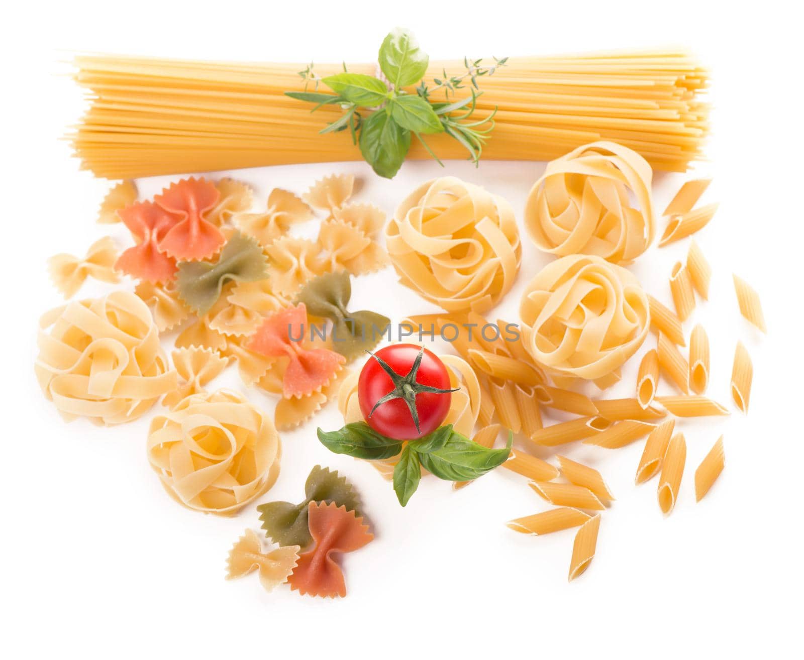 Spaghetti and basil isolated on white background. by aprilphoto