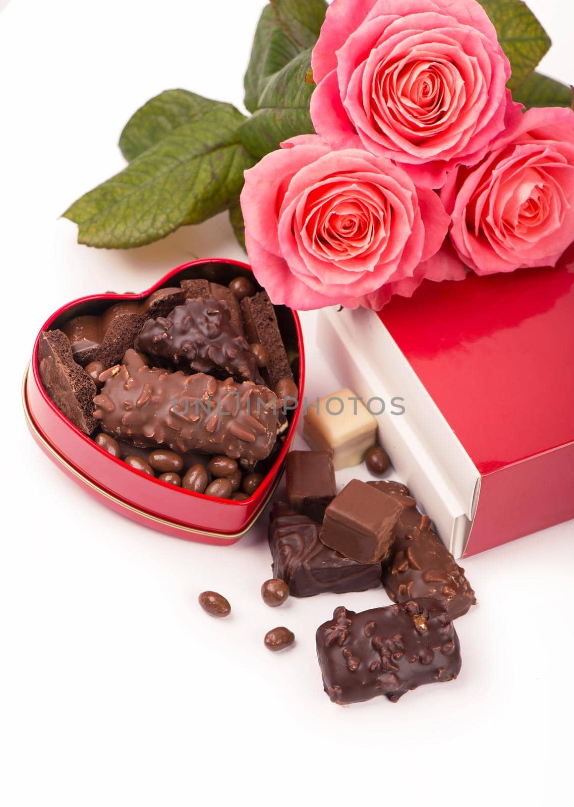 rose and dark chocolate for valentine day on isolate white background. by aprilphoto