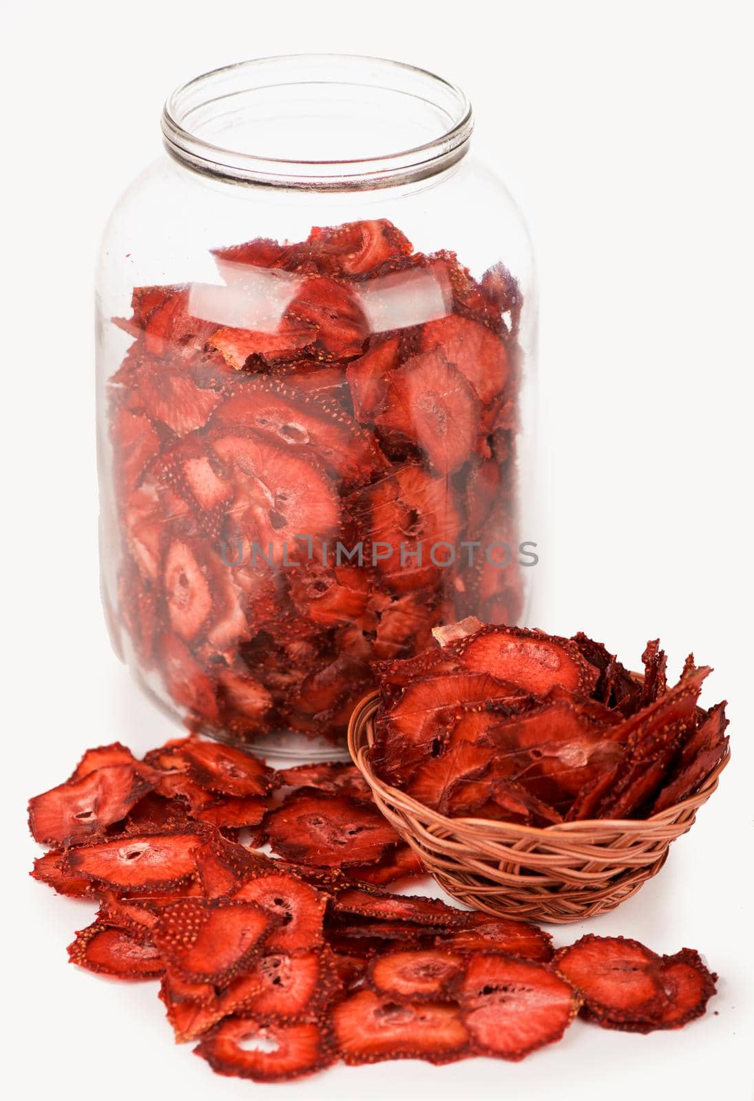 dried strawberry berries , strawberry fruit chips isolated on white background by aprilphoto