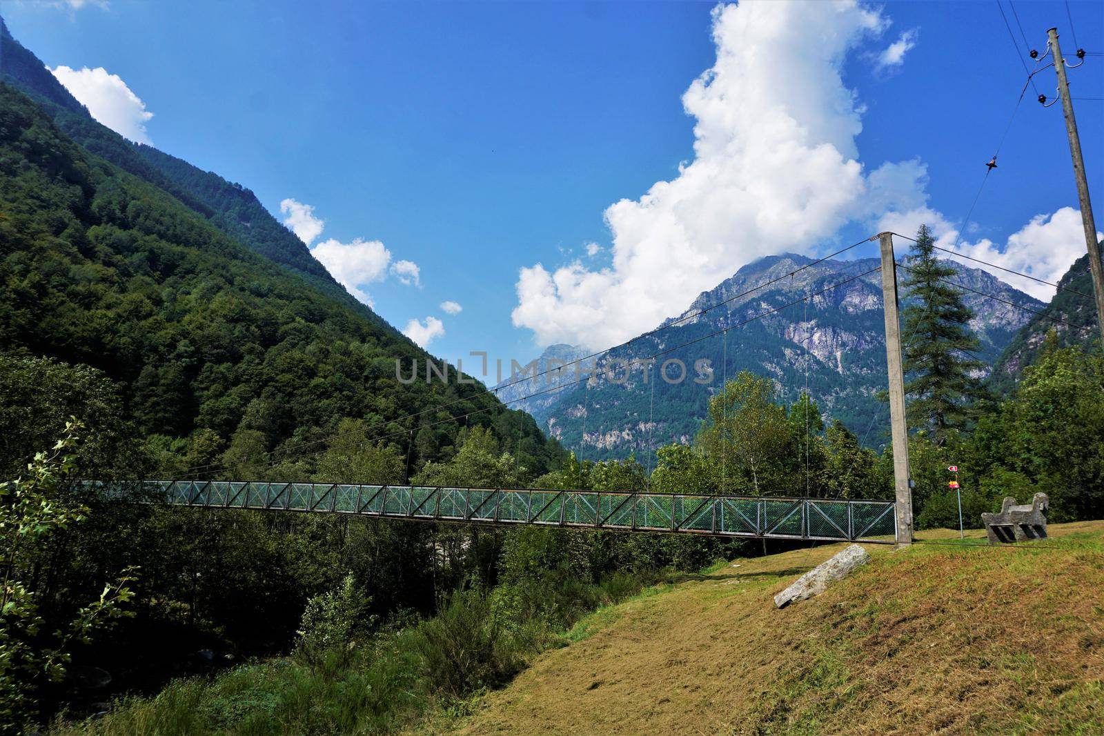 Wire rope bridge in front of the beautiful landscape of the Verzasca valley by pisces2386