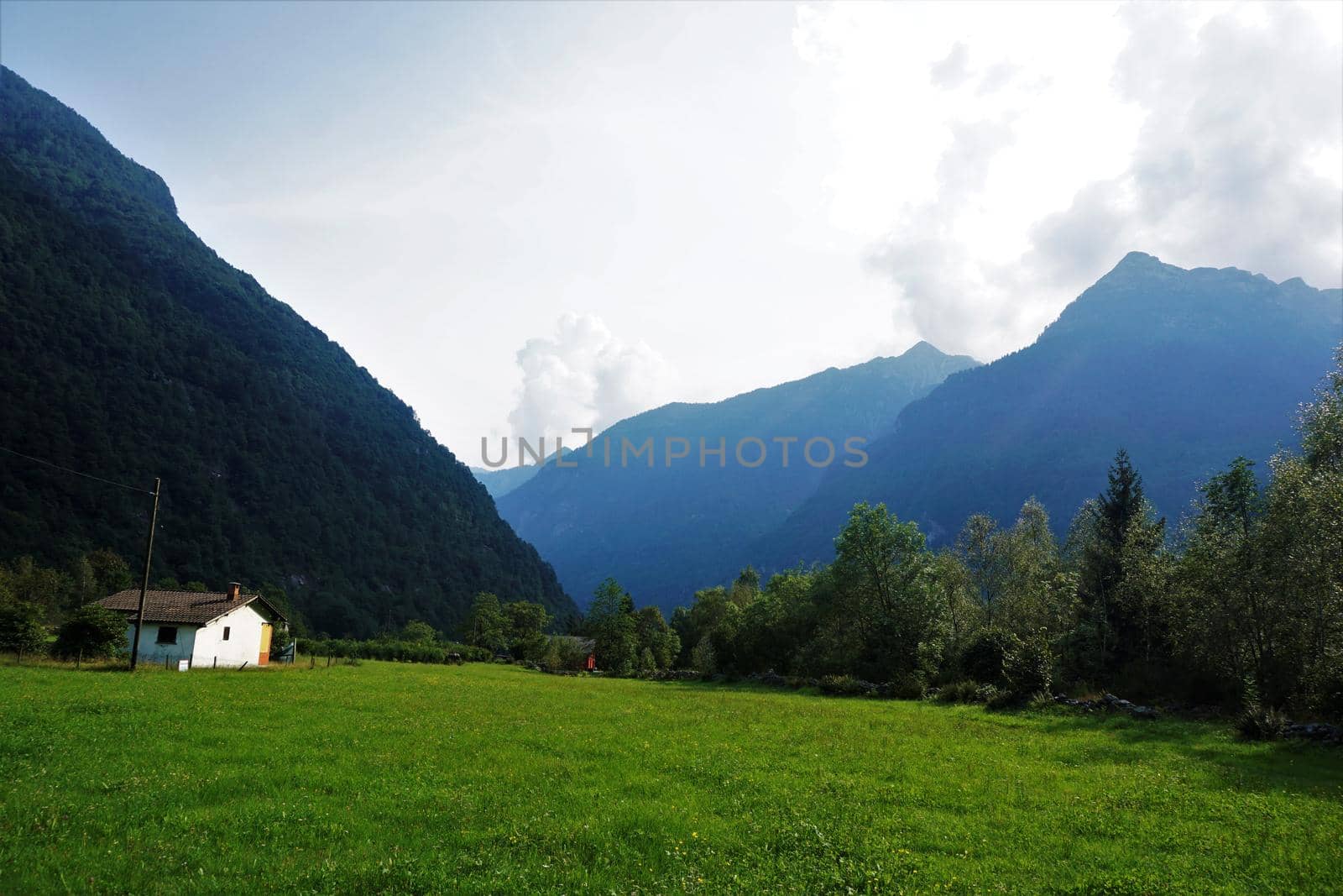 Farm house with plain meadow in Gerra, Verzasca Valley, Ticino, Switzerland