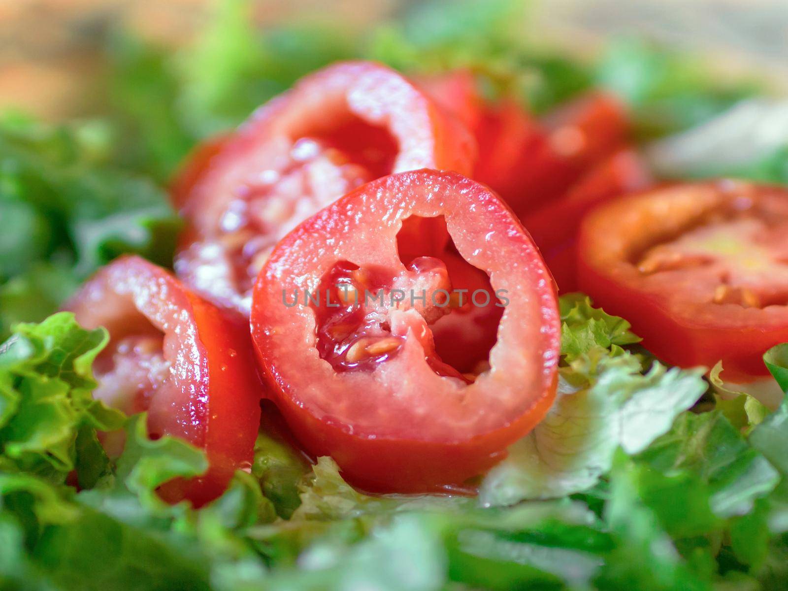 Salad with lettuce and fresh tomatoes.