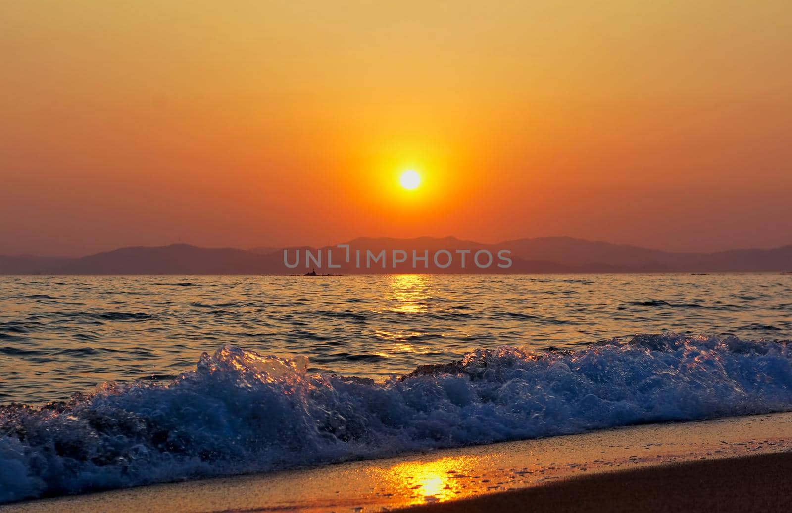 Seascape with beautiful sunset over the sea.