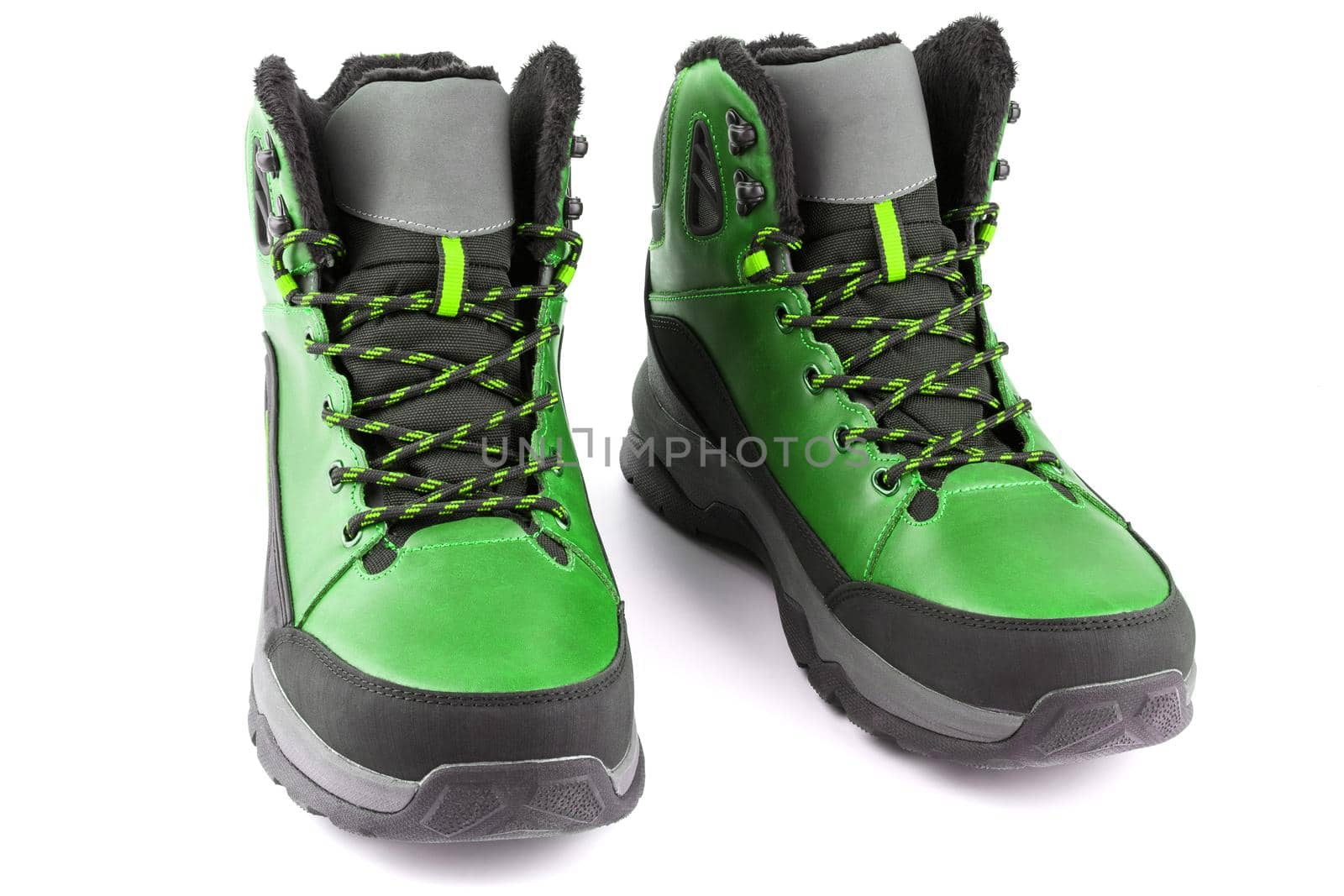 pair of green insulated winter warm three quarter sneaker or boot isolated on white background, perspective view