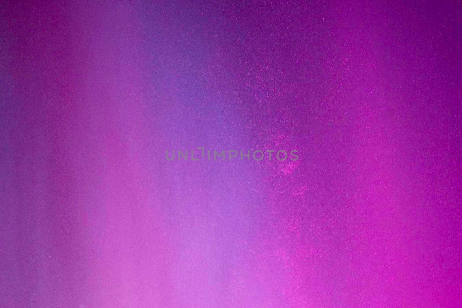 Abstract background of water drops in neon lighting. For design and networking.
