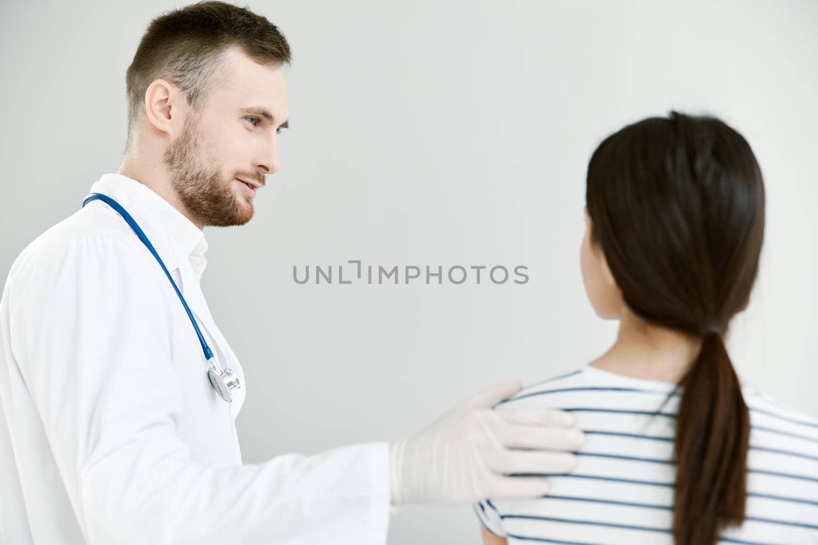 male doctor hospital patient treatment health care. High quality photo