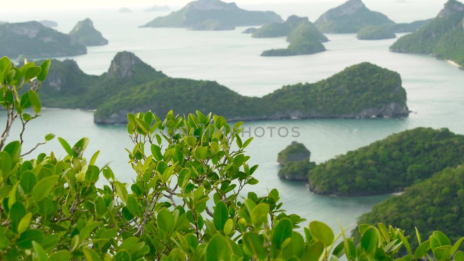 Bird eye panoramic aerial top view of Islands in ocean at Ang Thong National Marine Park near touristic Samui paradise tropical resort. Archipelago in the Gulf of Thailand. Idyllic natural background.