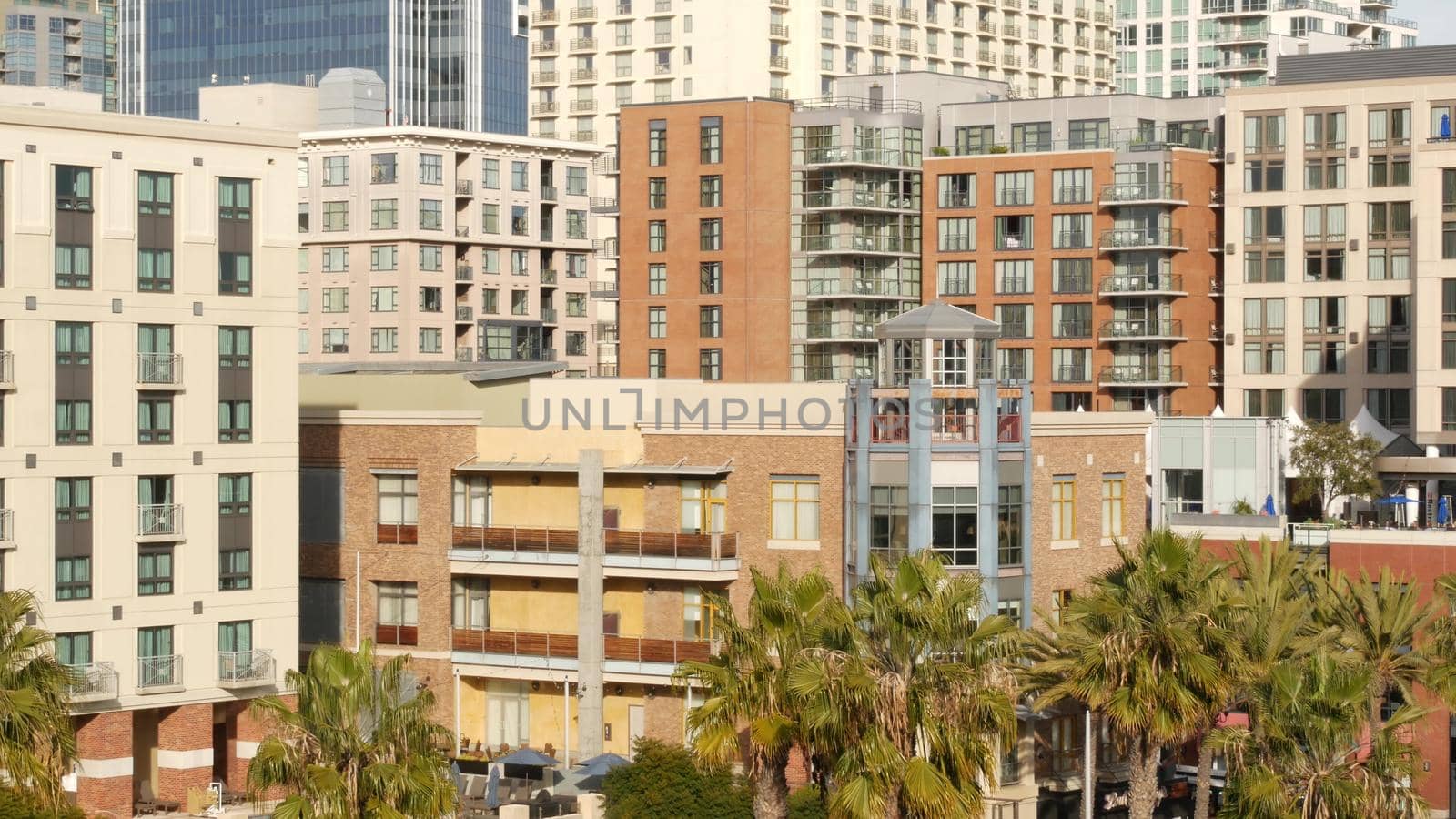 Metropolis urban skyline, highrise skyscrapers in city downtown, San Diego county, California USA. From above aerial view, lot of various buildings in Gaslamp Quarter. Overlook the financial district.