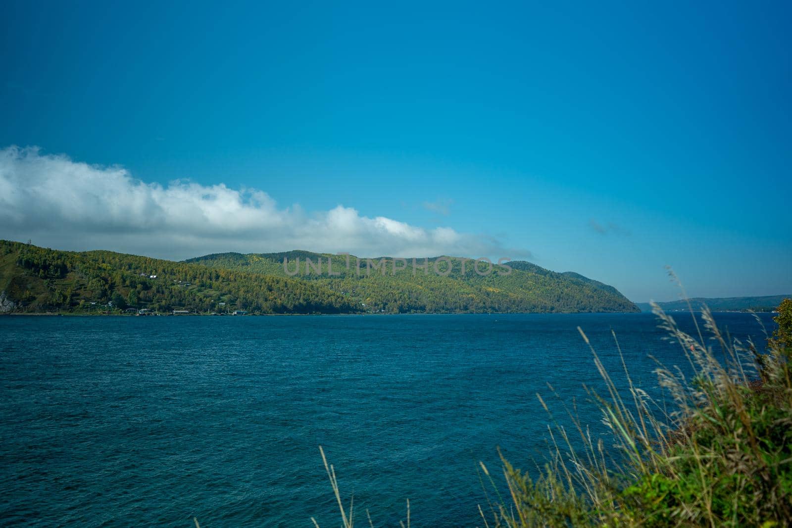 Natural background with a view of lake Baikal. Listvyanka, Irkutsk region