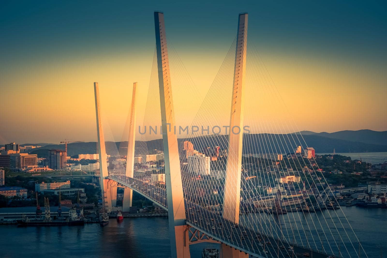 Urban landscape with a view of the Golden bridge. Vladivostok, Russia