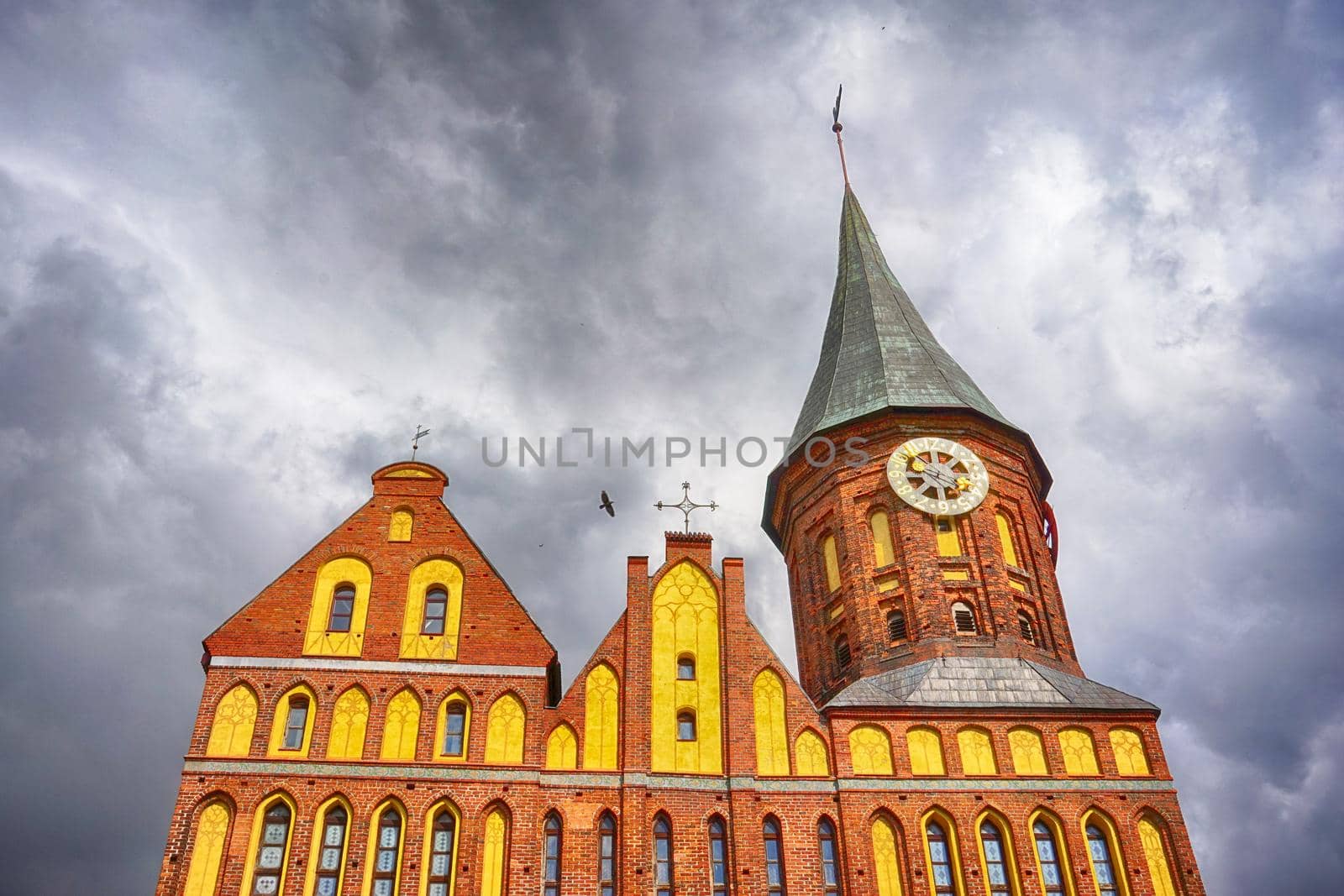 The sight of the city Cathedral on the background of cloudy sky
