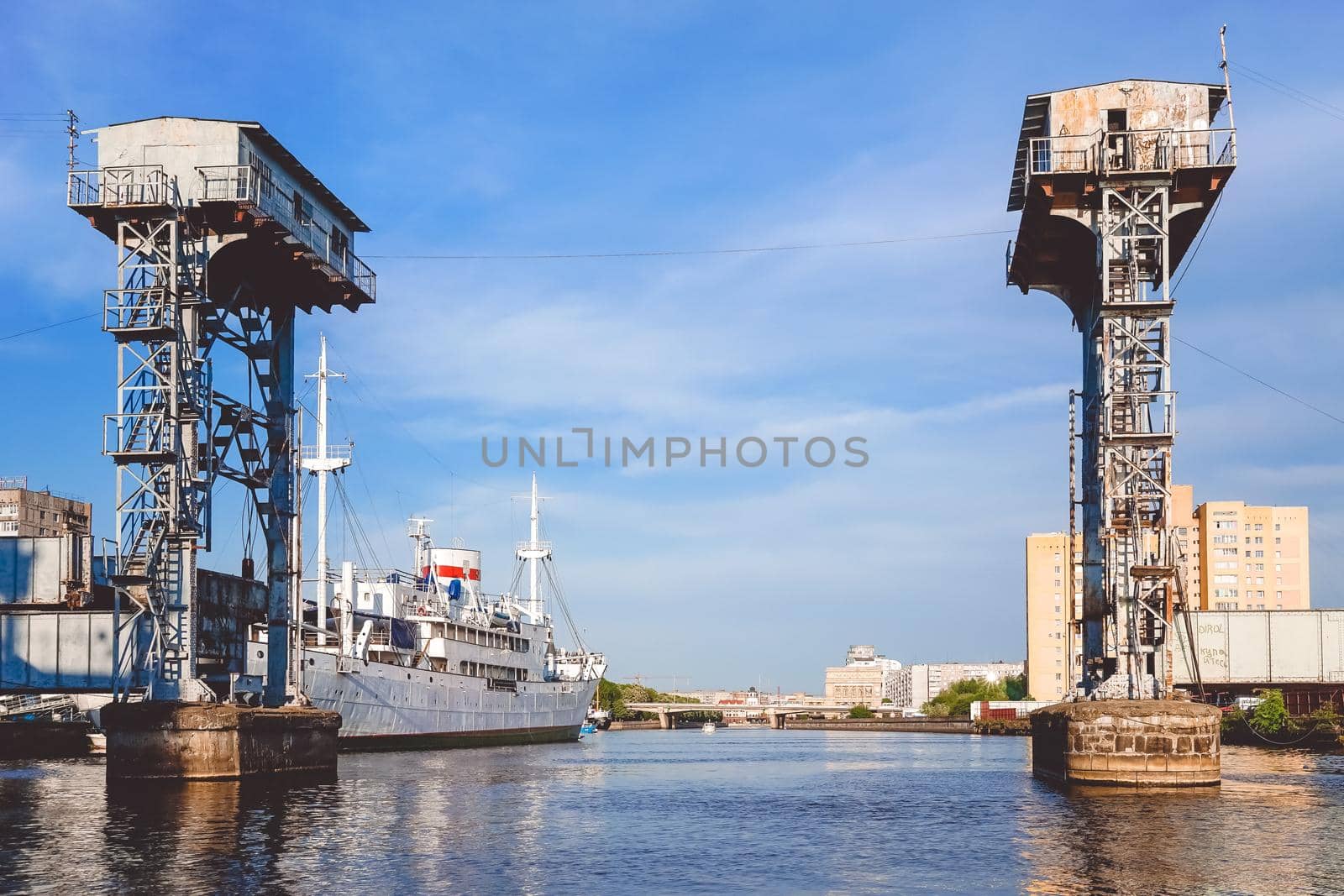 Kaliningrad , Russia. Port of a large Russian city with ships and various equipment on the background of the river.
