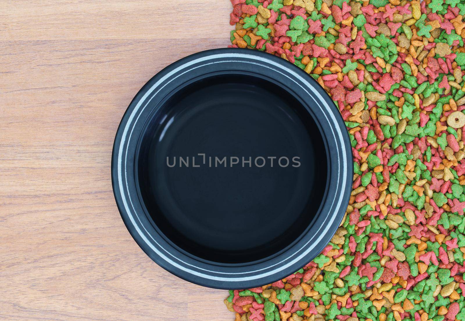 Top view dry food for cat and dog with empty bowl