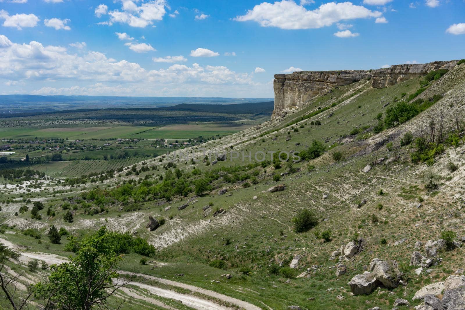 Mountain landscape with views Of the AK-Kaya mountain in the Crimea against the blue .