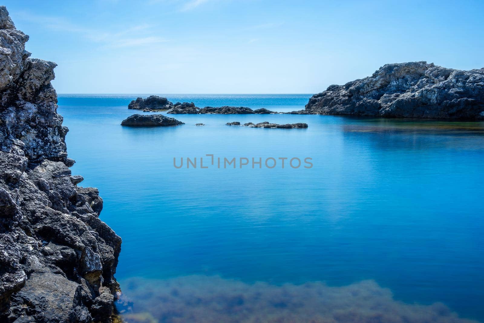 Beautiful view of us we are with the rocky shore of the black sea